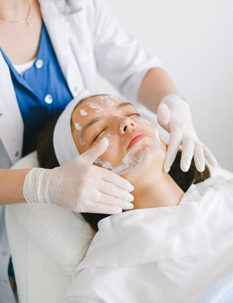 Woman undergoing aesthetic services.