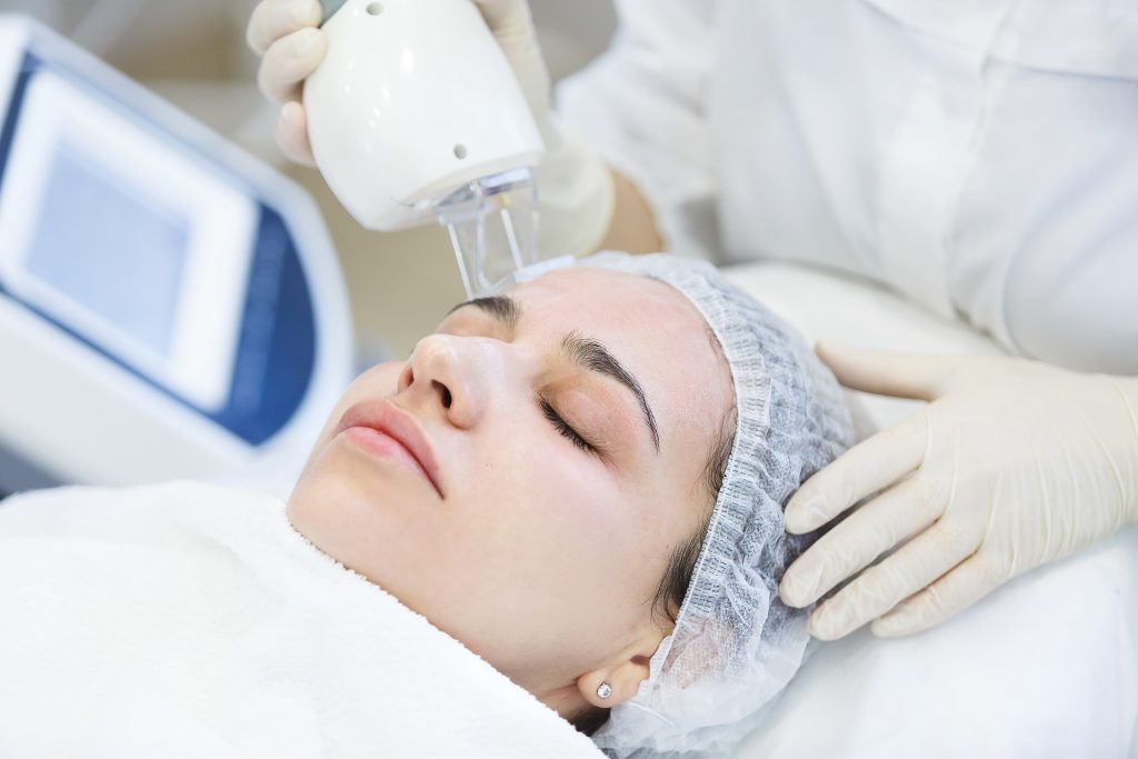 Woman undergoing hyperpigmentation treatment.